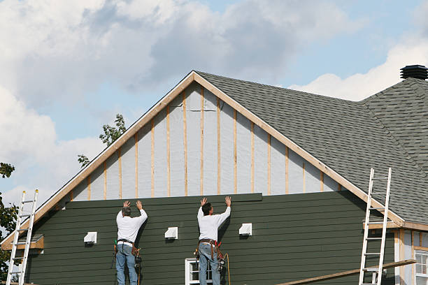 Professional Siding technician working in Minneapolis, MN